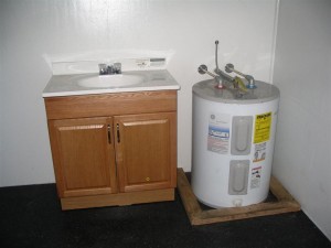 Restroom with sink and water heater